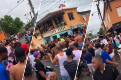 Jóvenes realizan ‘teteo’ bajo lluvia intensa en Santo Domingo Este